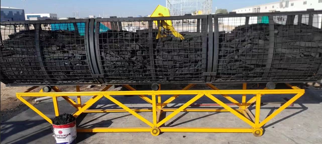 Carriage and material cage for a batch reactor