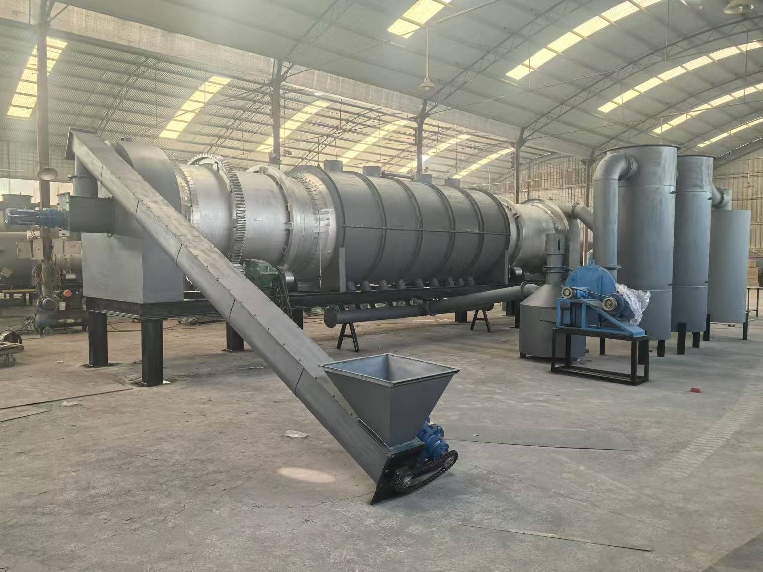 Pyrolysis plant feed and discharge side